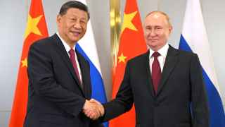 Си Цзиньпин и Владимир Путин на саммите ШОС в Астане